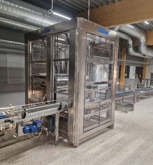 Low-level in-feed type machine